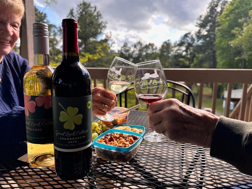 Couple cheers at Good Luck Cellars